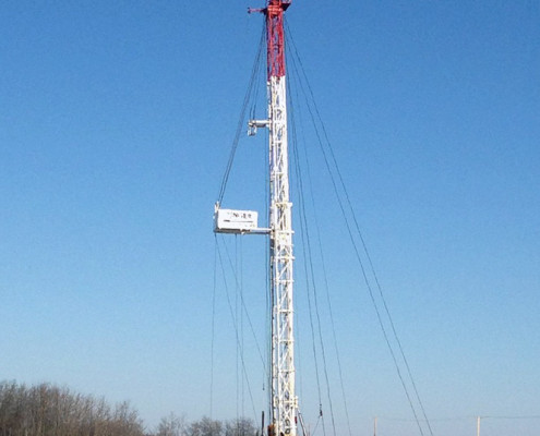 Ringer Well Service Equipment, hard at work onsite during winter